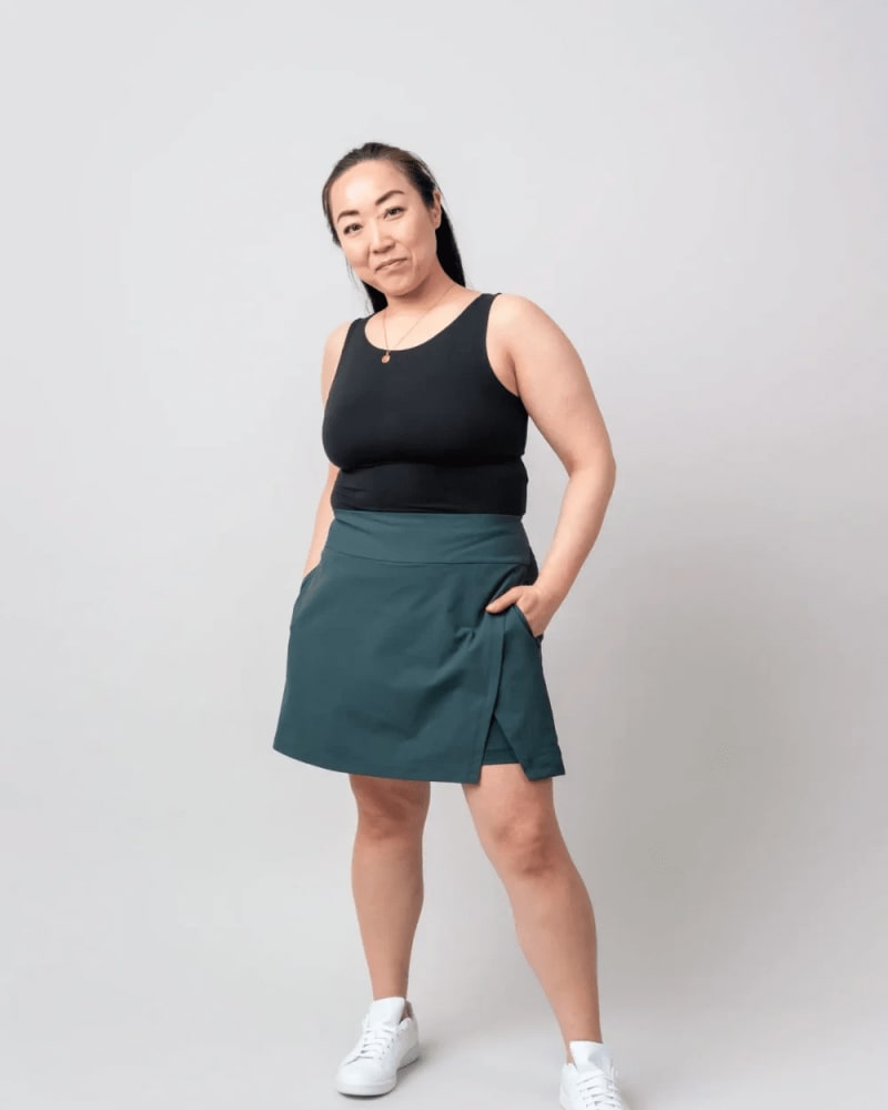 Front of a model wearing a size 3X get dirty skort in Forest green by alder apparel. | dia_product_style_image_id:300714